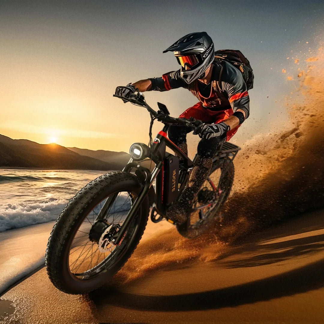 Electric Bike Duotts S26, powerful e-bike riding on a beach, showcasing rugged tires and sunset backdrop.
