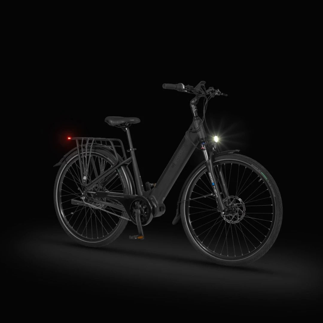 Electric Bike Ecobike Lx features a sleek black design with integrated lights and sturdy build for urban rides.