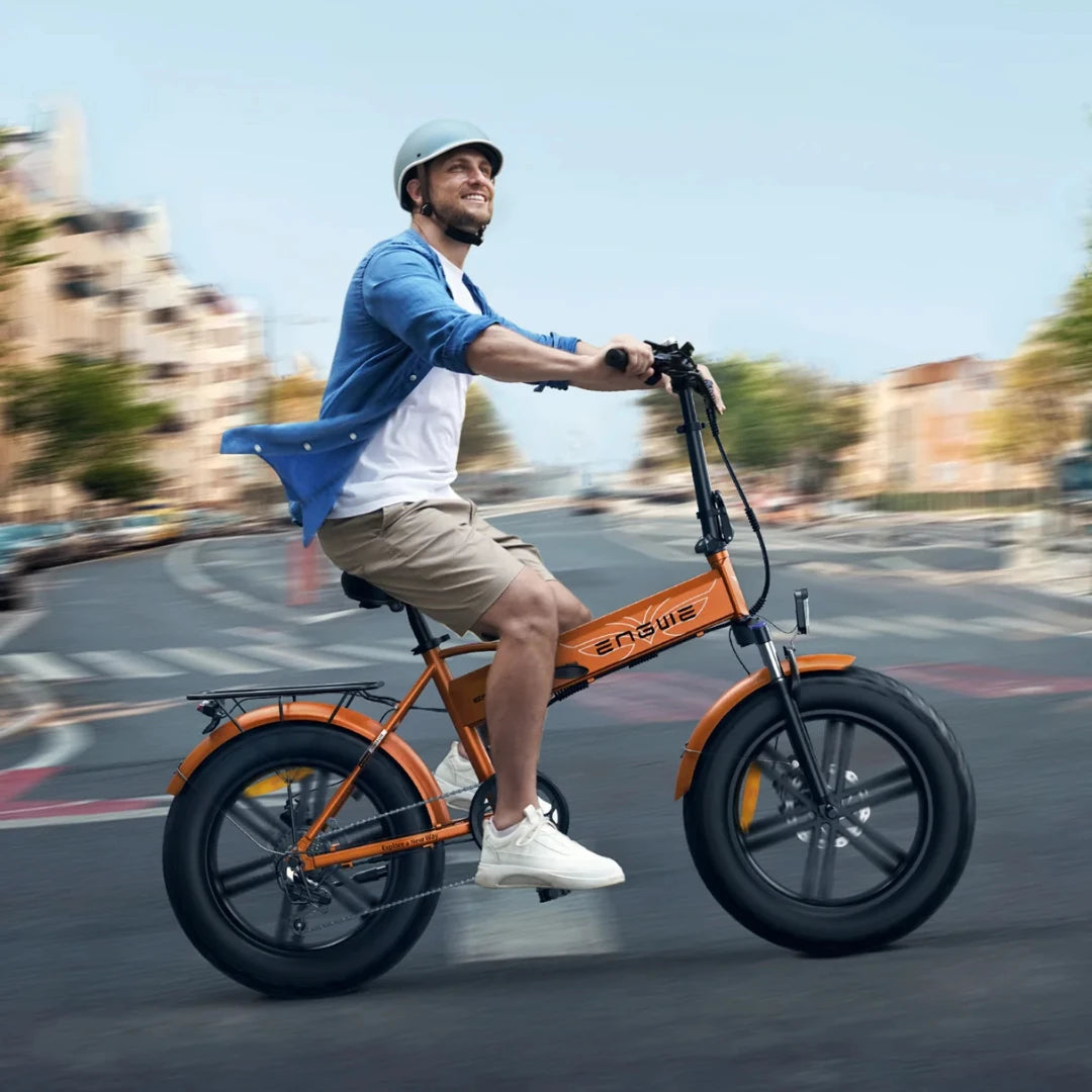 Electric Bike Engwe Ep 2 Boost, vibrant orange color, a rider enjoying a smooth urban ride.