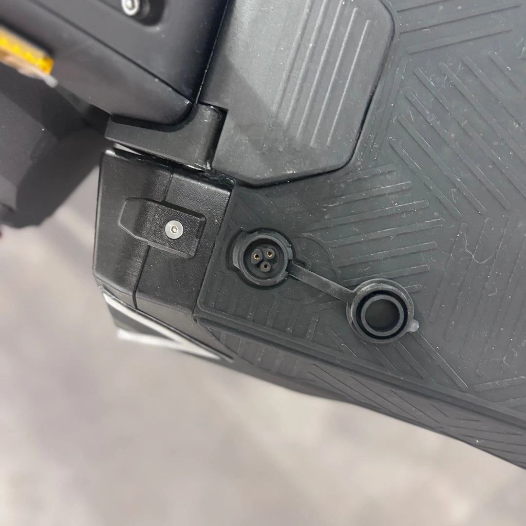 Electric Scooter Ms Energy Flare X Pro features a sleek design, showing a close-up of the charging port and details.