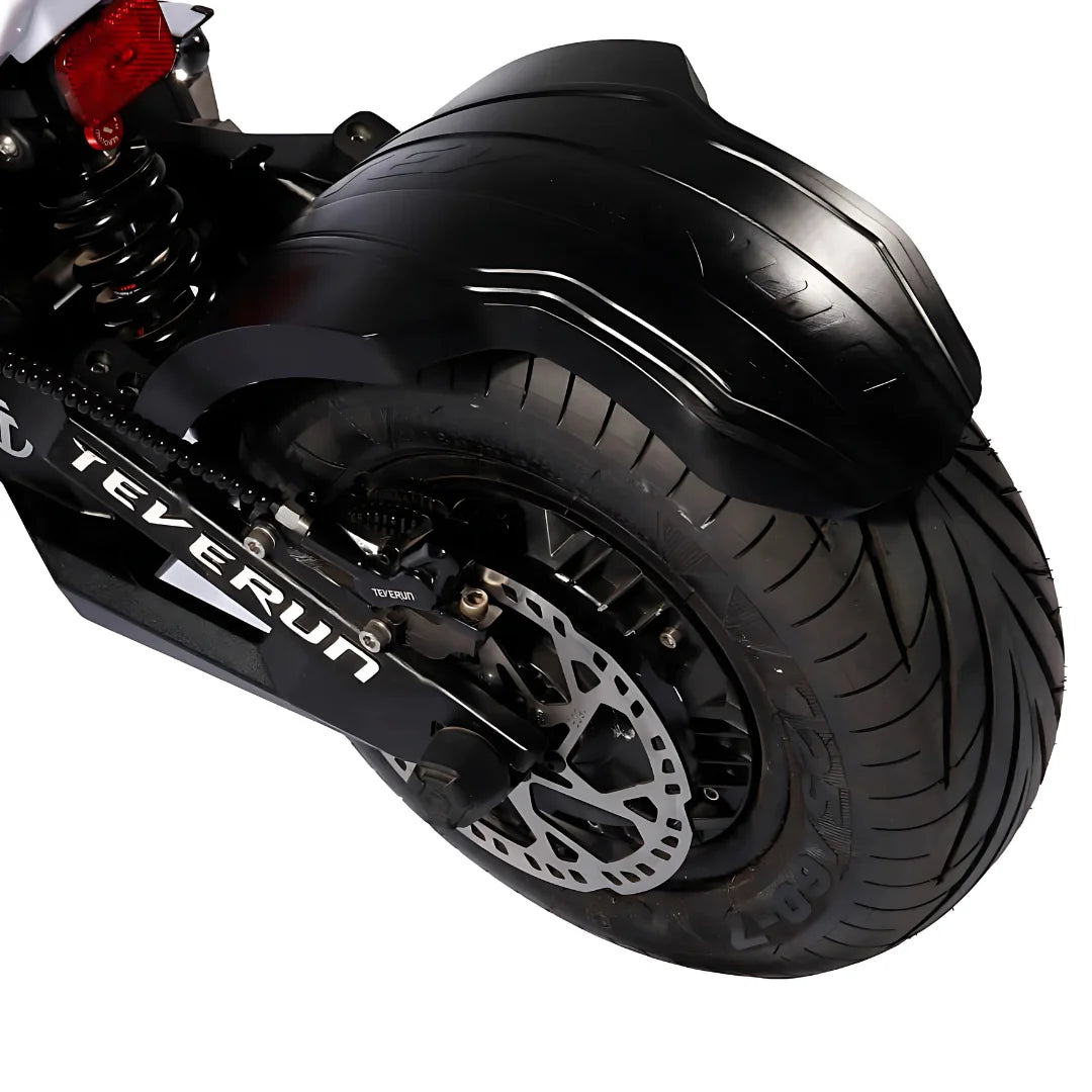 Product title: Electric Scooter Teverun Fighter Supreme 7260r. Description: Close-up view of the rear wheel, showcasing the robust tire, fender, and suspension system.
