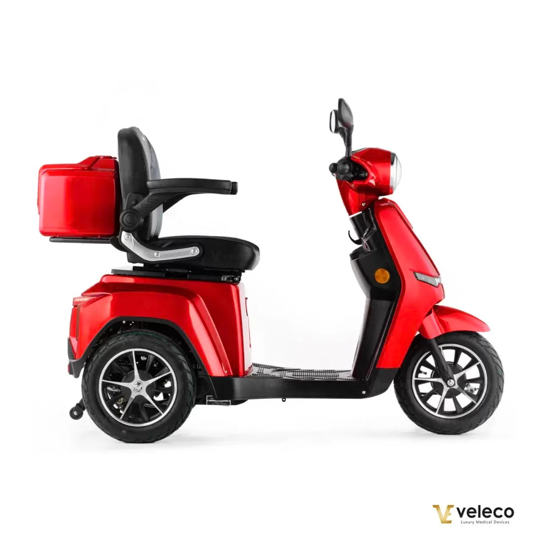 Electric Mobility Scooter Veleco Turris features a sleek red design, comfortable seat, and rear storage.