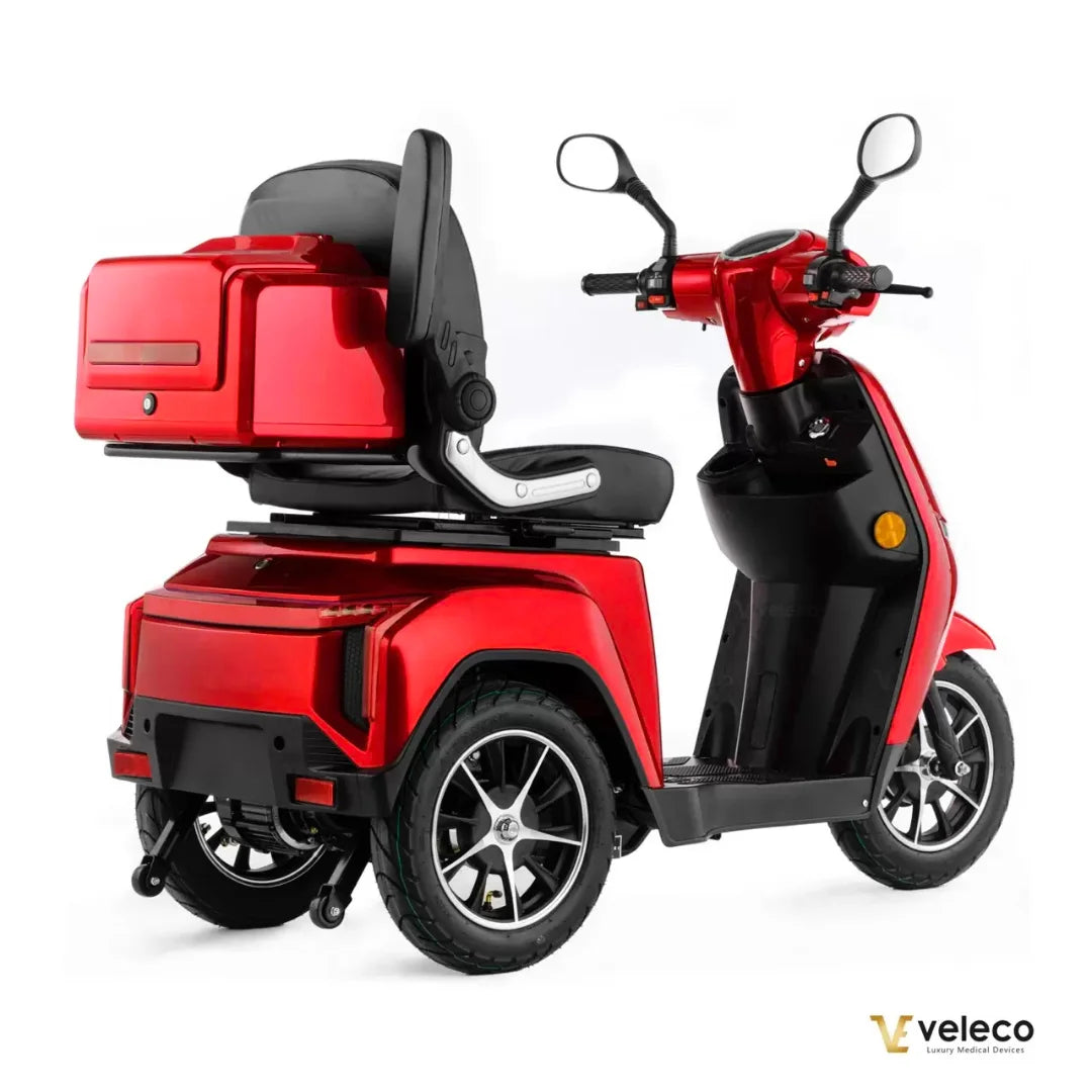Electric Mobility Scooter Veleco Turris features a stylish red design, comfortable seating, and a rear storage compartment.