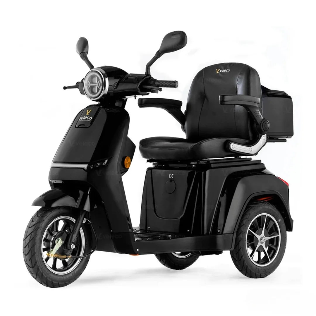 Electric Mobility Scooter Veleco Turris features a sleek black design, comfort seat, and sturdy wheels for stability.
