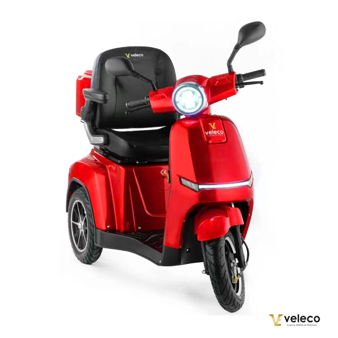 Electric Mobility Scooter Veleco Turris features a vibrant red design, comfortable seat, and powerful front light.