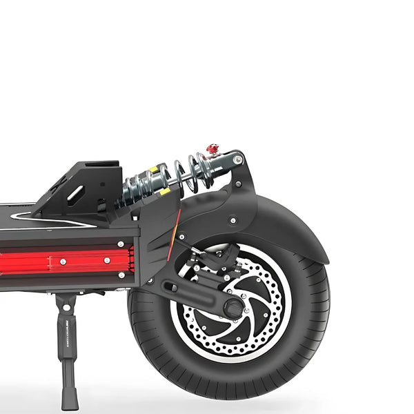 Izdelek na sliki je električni skiro, model Dualtron X Limited. Vidna je zadnja kolesna enota, ki vključuje močnino vzmetenja, disk zavore in široko pnevmatiko. Vzmetenje je zasnovano za udobno vožnjo, kar je pomembno za stabilnost in nadzor pri vožnji po različnih terenih. Na skiroju so tudi elementi za pritrditev in dodatno opremo.