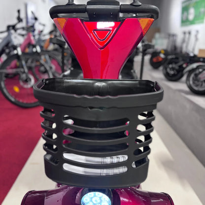 Electric Mobility Scooter Eco Speed Senior features a vibrant red frame, sturdy basket, and bright LED light.
