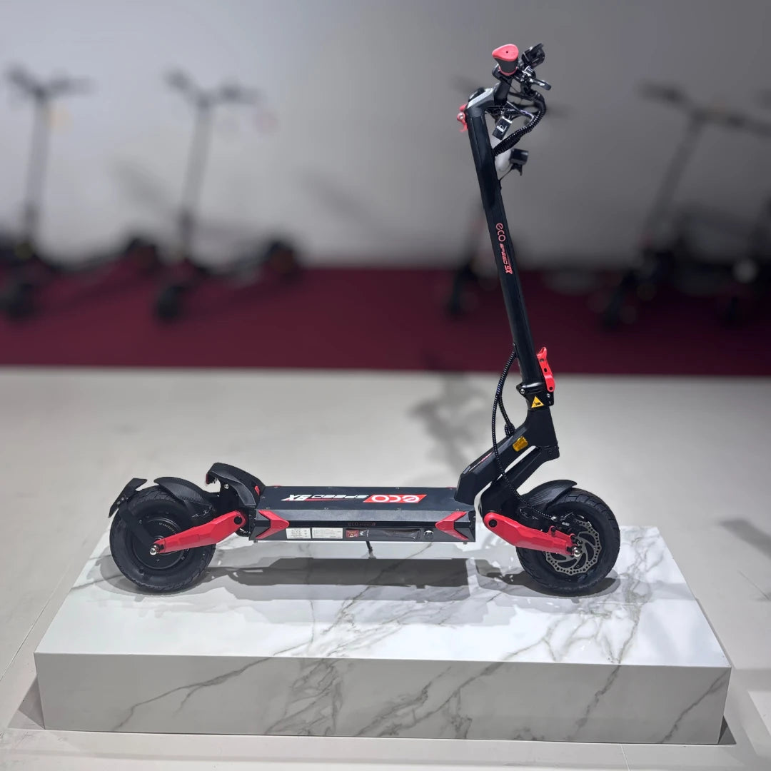 Electric Scooter Eco Speed 9x features a sleek design, sturdy frame, large tires, and stylish red accents.
