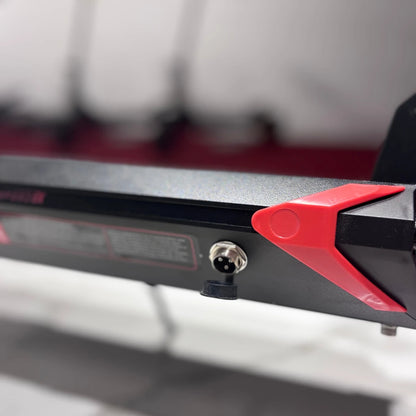 Electric Scooter Eco Speed 9x features a sleek design with red accents, showcasing charging ports and sturdy construction.