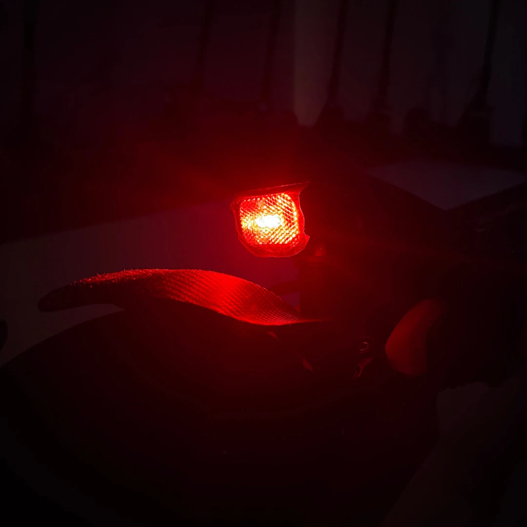 Electric Scooter Eco Speed 9x features a bright red tail light for visibility and safety at night.