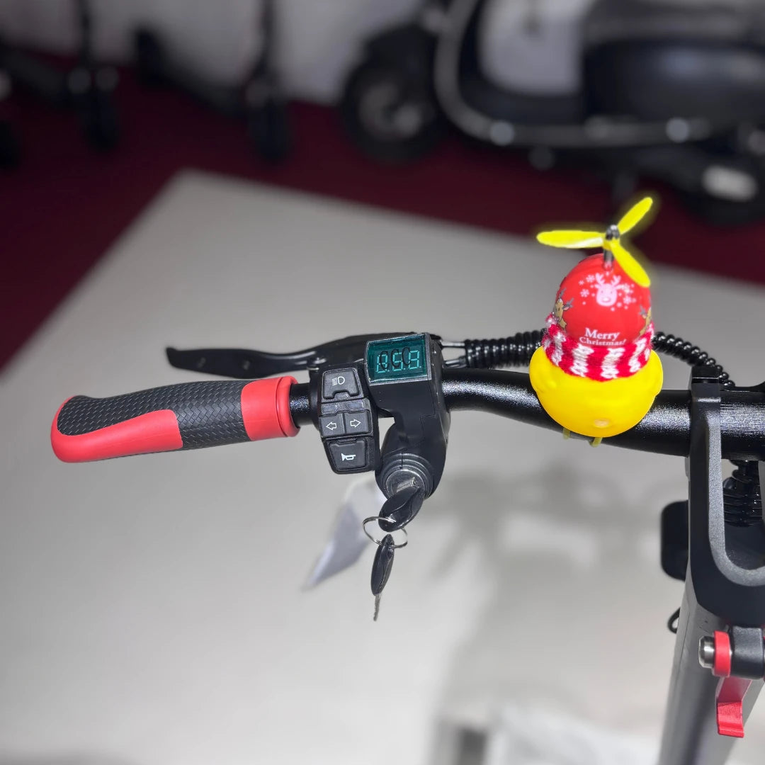 Electric Scooter Eco Speed 9 features a sleek handlebar with digital display and festive decoration.