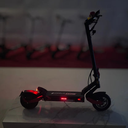 Electric Scooter Eco Speed 9 features a sleek design with glowing lights, ideal for urban commuting and fun.