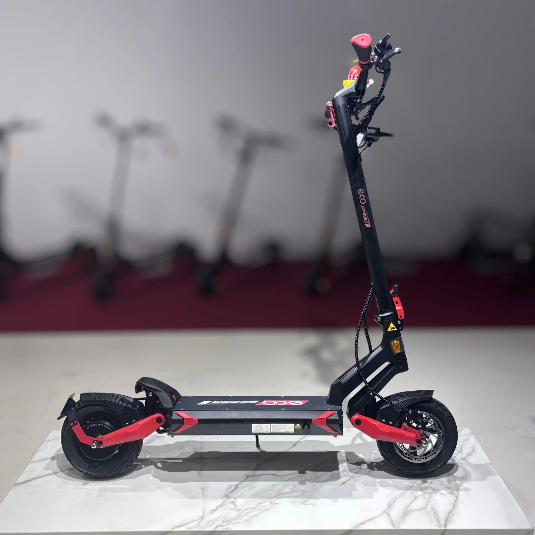 Electric Scooter Eco Speed 9 features a sleek design, red accents, sturdy frame, and front suspension for a smooth ride.