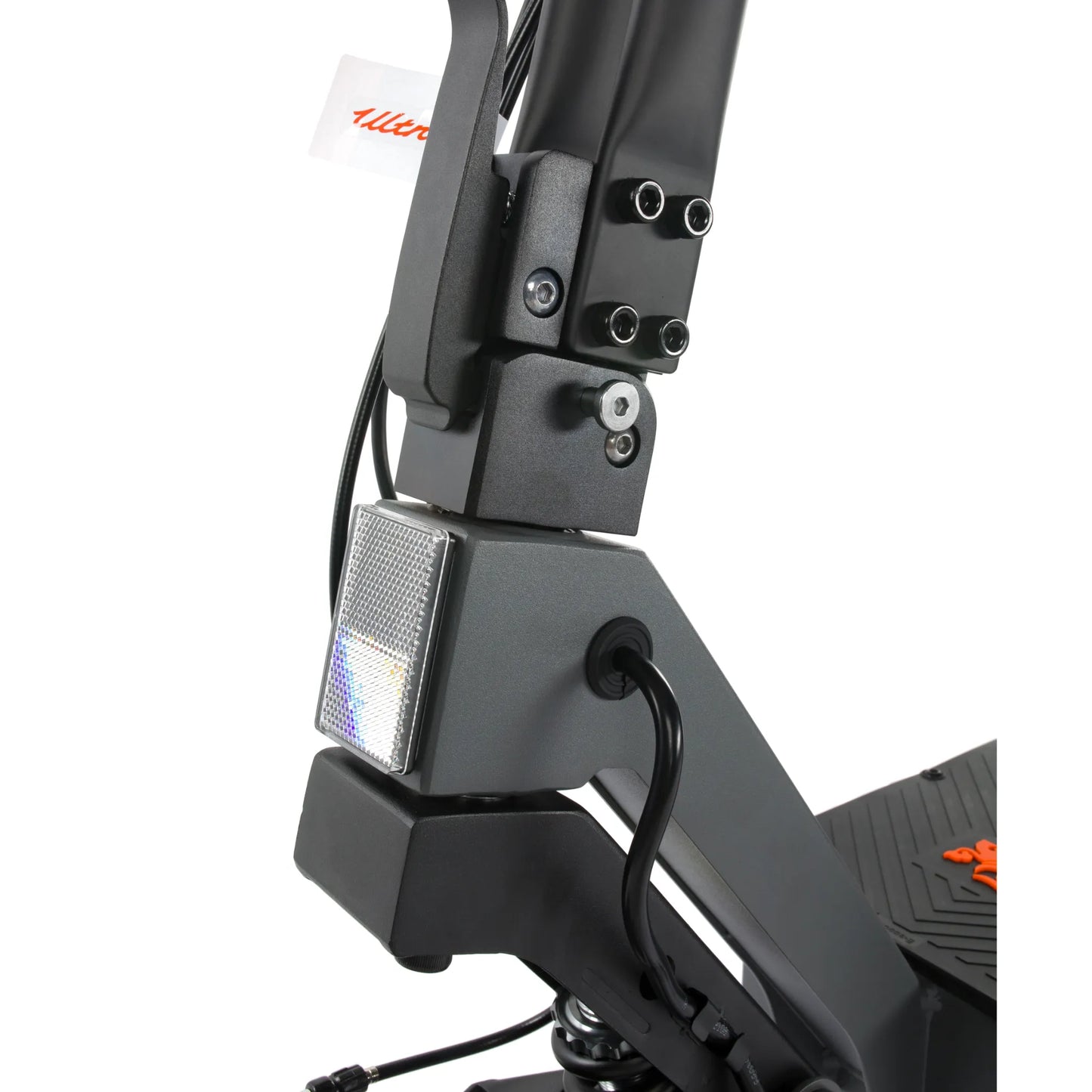 The product in the picture is an electric scooter, model Kukirin G2 Ultra. The picture shows a part of the scooter's frame, which includes the handlebar mount, a reflector, and part of the electrical wiring. The color is dark, and the material looks robust and durable, which indicates high-quality construction.