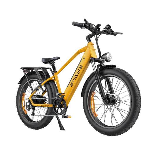 Izdelek na sliki je električno kolo, znamke Engwe, model E26. Kolo ima svetlo rumeno barvo in široke pnevmatike, kar ga naredi primernega za različne terene. Vidna je tudi sprednja luč, vzmetna vilica ter nosilec za prtljago na zadnjem delu kolesa.