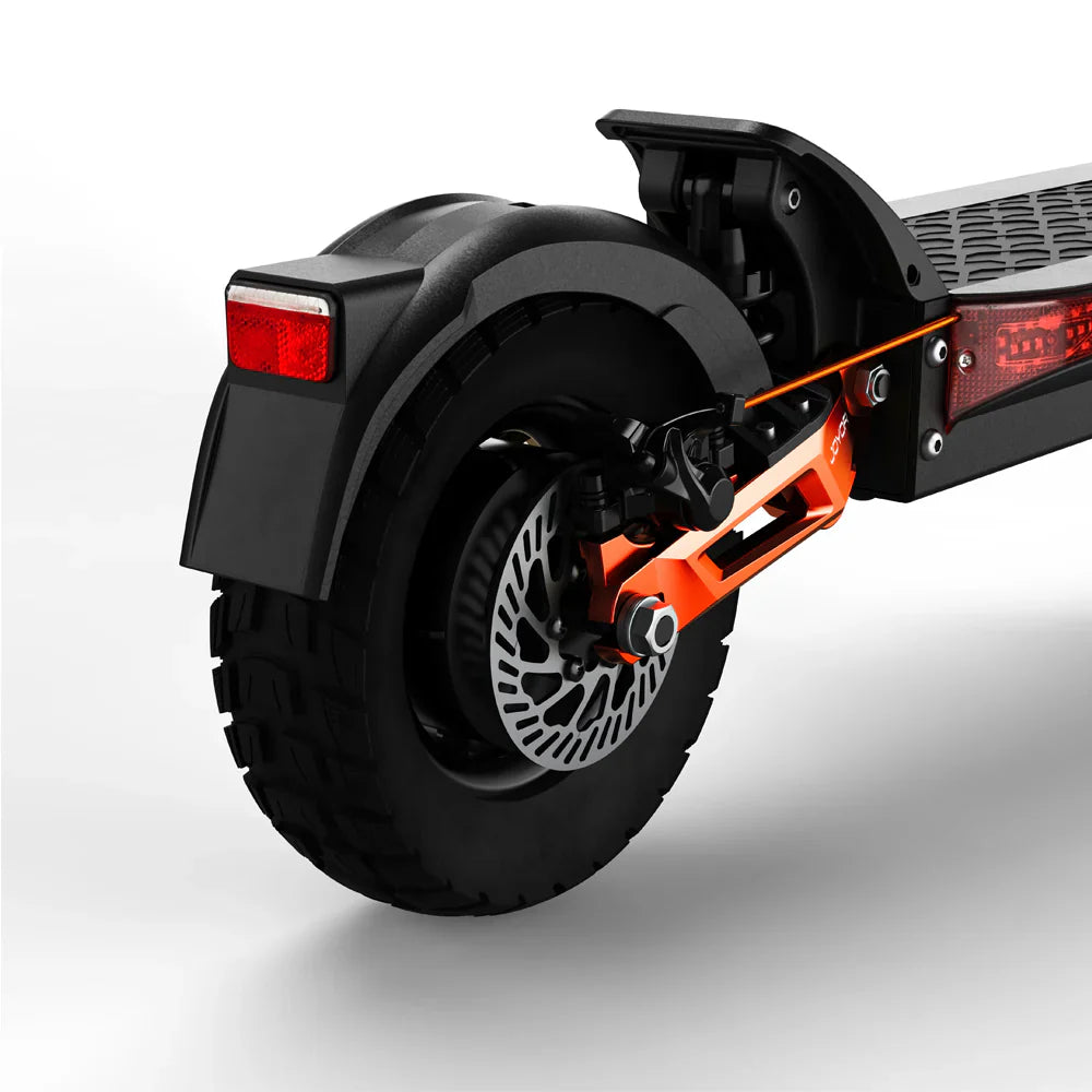 The product is a Joyor T6 electric scooter. The picture shows the rear part of the scooter, which includes a wide rear wheel with a rugged profile, a disc brake, and a light unit. The connection between the wheel and the frame is also visible, highlighted in orange, which gives the scooter a dynamic look.