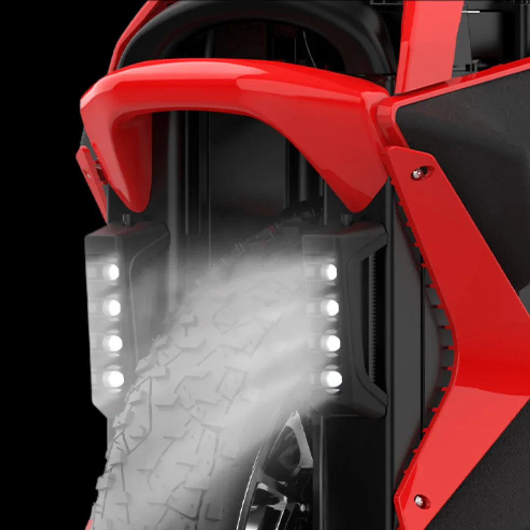 Izdelek je električni monocikel, znamke Kingsong, model S22 Pro. Na sliki je prikazana sprednja stran monocikla, kjer so vidni LED luči ob stranicah ter del kolesa z izrazitim profilom, kar nakazuje na njegovo zmogljivost in stabilnost. Rdeča barva daje izdelku dinamičen in športen videz.