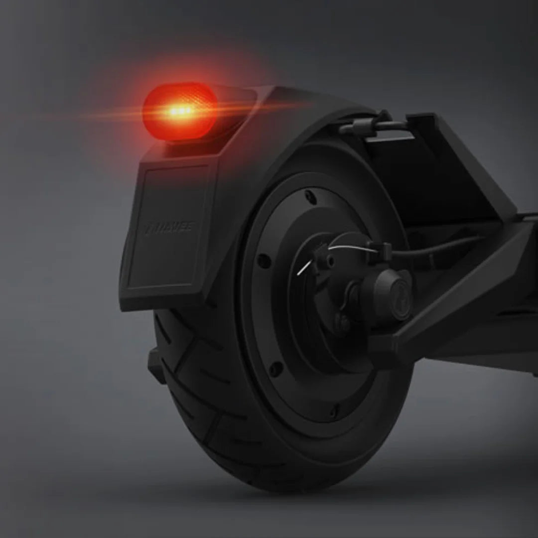 Electric Scooter Navee S60 features a robust rear wheel with a prominent brake light for safety.
