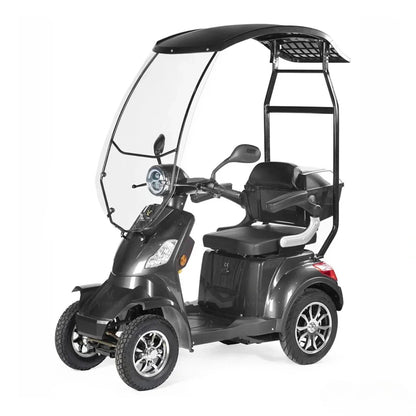 Izdelek na sliki je električni skuter, model Veleco Faster. Na sliki je prikazan triosni električni skuter s kabino, ki nudi zaščito pred vremenskimi vplivi. Ima udobno sedežno površino in je zasnovan za enostavno vožnjo, kar ga naredi primernega za različne uporabnike.