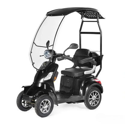 Izdelek je električni skuter, model Veleco Faster. Na sliki je prikazan črn električni skuter s tremi kolesi, ki ima zaščitno streho in vetrobransko steklo. Skuter je zasnovan za udobno vožnjo, saj vključuje široko sedežno površino in ročne naslone. Vidne so tudi kromirane platišča, kar dodaja estetski pridih.