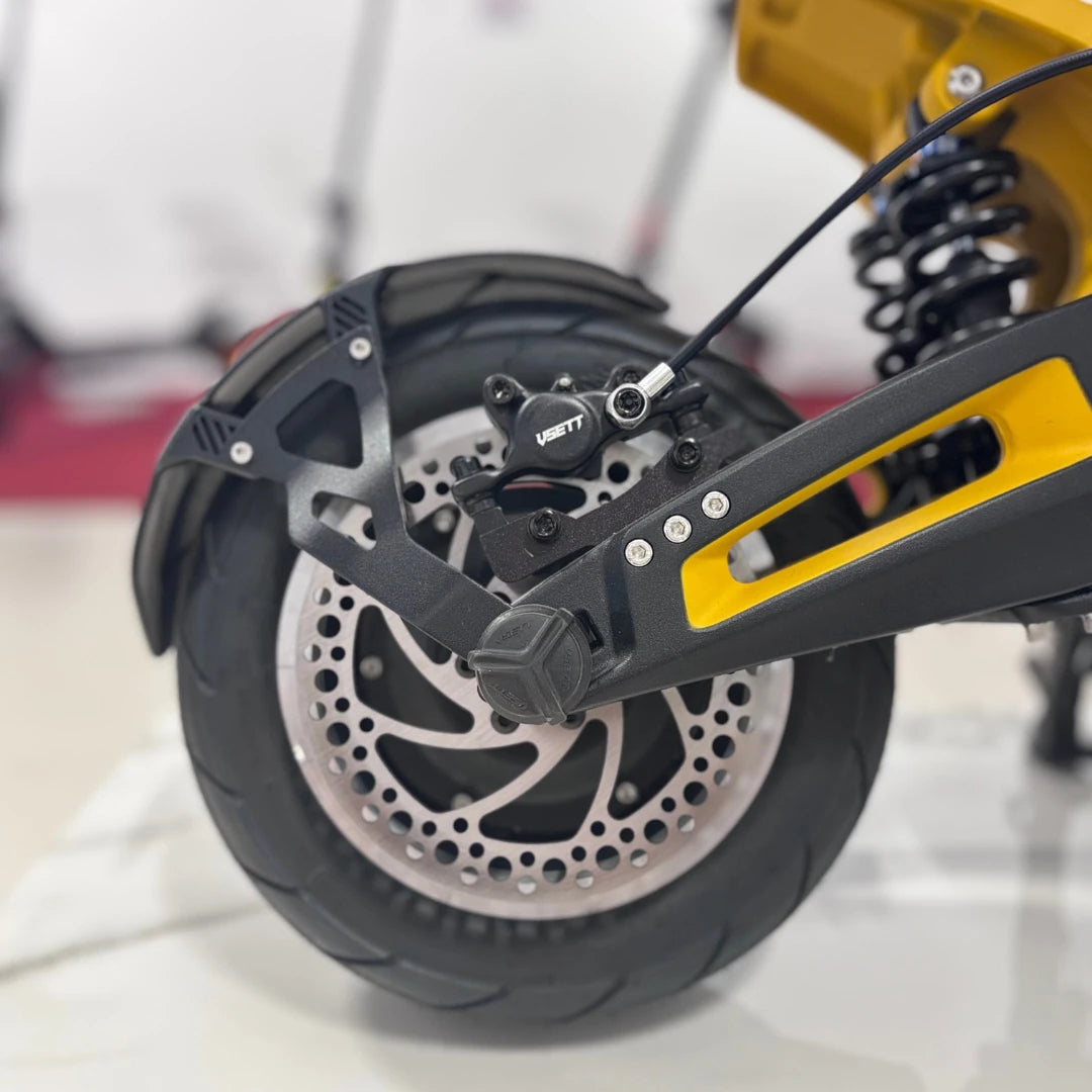 Electric Scooter Vsett 11 Super features a robust rear wheel with a sleek disc brake system, enhancing performance.