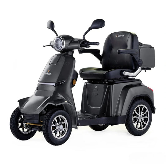 Električni mobilni voziček Veleco Gravis, eleganten trikolesni skiro v temno sivi barvi.