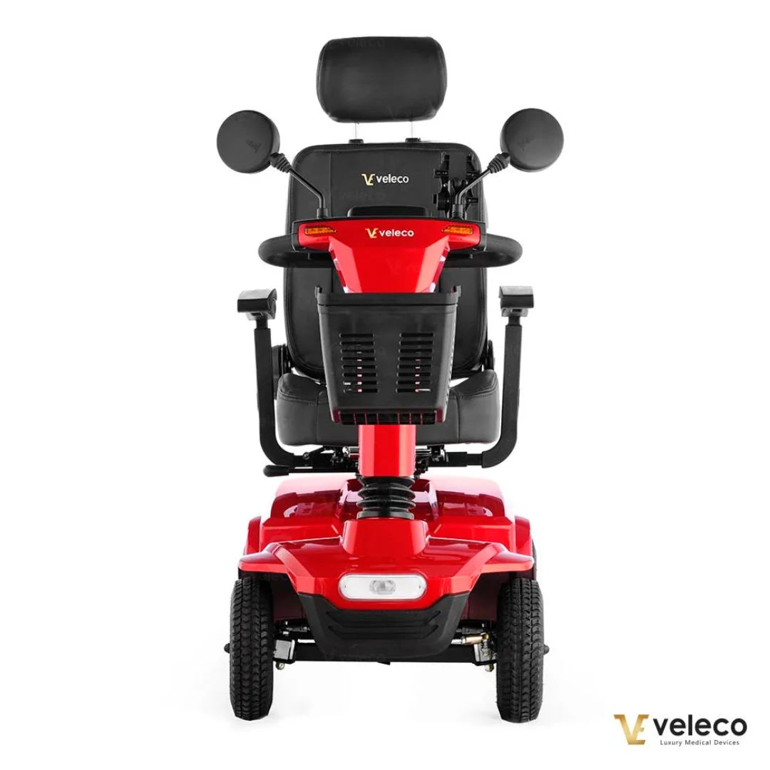 Sprednji pogled električnega mobilnega vozička Veleco Jumpy, ki se ponaša z elegantnim rdečim dizajnom.