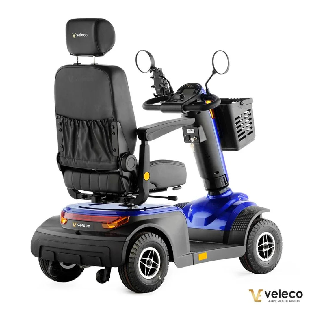 Električni mobilni voziček Veleco Looper, z modrim okvirjem in udobnim sedežem.