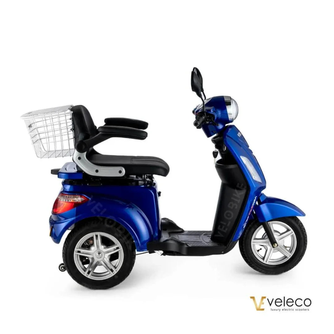 Stranski pogled modrega električnega mobilnega vozička Veleco ZT15 s košaro in udobnim sedežem.
